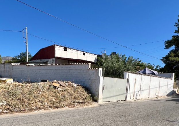 Οικόπεδο με κτίσμα 229 sq.m. σε πλειστηριασμό Municipality of Acharnon